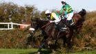 Leighton Aspell rides Many Clouds on his way to the jockey’s second successive Aintree Grand National win. Photograph:  Clive Rose/Getty Images