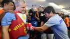 Manny Pacquiao sparring with his trainer Freddie Roach in his last scheduled public appearance before his fight against Floyd Mayweather on May 2nd. Photograph: Afp 
