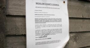 A site notice regarding an application for  retention planning permission located outside the timber chalet at Tinode, Blessington, Co Wicklow. Photograph: Nick Bradshaw