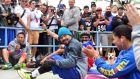 A crowd gathers to watch as boxer Manny Pacquiao, together with suporters and training mates, work out at a park following his morning jog in Los Angeles. Photograph: AFP PHOTO  
