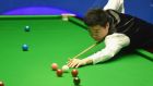Ding Junhui of China in action during his match against John Higgins at the World Snooker Championship in Sheffield. Photo: Michael Regan/Getty Images