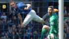 Everton’s James McCarthy  scores past Manchester United goalkeeper David de Gea during the 3-0 win at Goodison Park.  Photograph: Paul Ellis/AFP