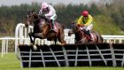 Douvan and Ruby Walsh  clears the last fence on the way to winning the Champion Novice Hurdle at Punchestown. Photo: Donall Farmer/Inpho