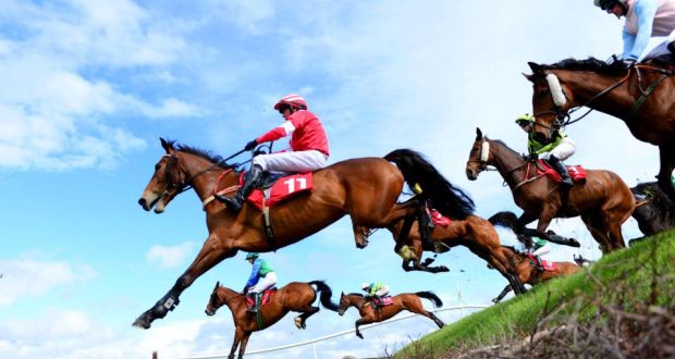 Runners and riders, including eventual winner Wish Ye Didnt ridden by Nina Carberry, clear Ruby’s Double during the Kildare Hunt Club Fr Sean Breen Memorial Chase at Punchestown. Photograph: Pat Healy/PA
