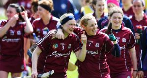 Galway’s Sarah Dervan and goalkeeper Susan Earner celebrate after victory in the Camogie  Division One League final at Semple Stadium, Co Tipperary.  Photograph: Inpho   