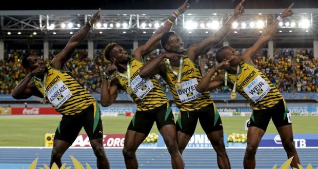 Jamaica’s 4x200 relay team strike a pose on the medal podium after winning the event at the IAAF World Relays Championships in Nassau Bahamas; Nickel Ashmeade, Jason Livermore, Rasheed Dwyer and Warren Weir. Photo: Mike Segar/Reuters