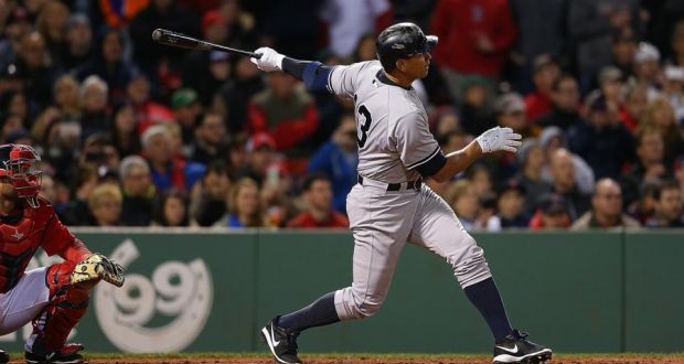 Alex Rodriguez hits his 660th career home run to tie Willie Mays record during a game with Boston Red Sox in the 8th inning at Fenway Park Boston, Massachusetts. Photo: Jim Rogash/Getty 