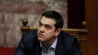 Alexis Tsipras, Greece’s prime minister, looks on prior to speaking to MPs in Athens, Greece . Photographer: Kostas Tsironis/Bloomberg  