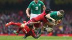  Luke Charteris tackles Jamie Heaslip during the Six Nations match in Cardiff. Initially Charteris was credited with 37 tackles during the game but that has now been reduced by six. Photograph: Michael Steele/Getty Images.