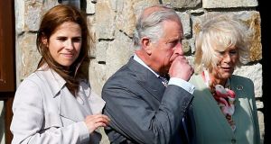Britain’s Prince Charles (C) and his wife Camilla Parker Bowles  visit the village of Mullaghmore where his great uncle Lord Mountbatten was killed in an IRA bomb attack in 1979, in Ireland on Wednesday. Photograph:  Darren Staples/Reuters