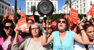 Protest: Moroccans demonstrate against Islamist premier Abdelilah Benkirane, who urged women to stay at home and look after their families. Photograph: Fadel Senna/AFP/Getty 