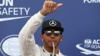 Mercedes’ Lewis Hamilton celebrates after taking his first pole position at the Monaco Grand Prix. Photo:  Stefano Rellandini/Reuters