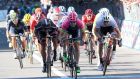 Italia rider Sacha Modolo crosses the finish line to win the 17th stage of the 98th Giro d’Italia between Tirano and Lugano. Photograph: Getty Images  