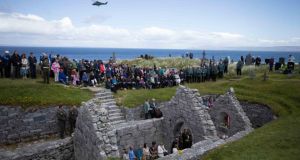 Mass takes place in Teampall Chaomhán, Inis Óirr on Friday as part of the commemoration Ceremony for Private Caomhán Seoighe. Photograph:  Eamon Ward.