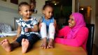 Somali speaker Iftina Abdule with her daughters Isra (3) and Ishraq (15 months) in her home in Blanchardstown, Dublin. Photograph: Aidan Crawley