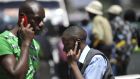 People speaking on the phone in Nairoi. Many talk about how African countries are “leapfrogging” economic growth stages with the adoption of cellular and internet technologies. Photograph:  Simon Maina/AFP/GettyImages