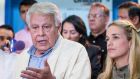  Former  Spanish prime minister Felipe Gonzalez speaks to journalists after a meeting  Lilian Tintori (right)  and other  wives of Venezuelan imprisoned opposition leaders, and  members of the opposition alliance  in Caracas, on Monday. Photograph: Miguel Gutierrez/EPA