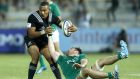 Roy Moloney tries to shackle New Zealand’s Tevita Li during Ireland’s 25-3 loss. Photograph: Inpho