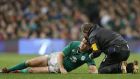 Ireland’s Jonathan Sexton receives treatment after getting a bang on the head against Australia last November. Photograph: Colm O’Neill/Inpho