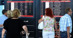 Tourists leave Tunisia at the Enfidha International airport on Saturday  in the aftermath of a shooting attack in which 38 people were killed. Photograph: Getty