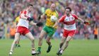 Donegal’s Colm McFadden tries to evade Niall Holly and Oisin Duffy at Clones. Photograph: Andrew Paton/Inpho/Presseye