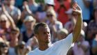 Lleyton Hewitt waves goodbye to the fans on Court Two after he was beaten in the first round of Wimbledon by Jarkko Nieminen. Photo: Stefan Wermuth