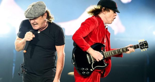 British singer Brian Johnson (left) and Scottish-born Australian guitarist Angus Young of AC/DC performing on stage in the Olympiastadion in Berlin last week as part of their Rock Or Bust World Tour. Photograph: Britta Pedersen/EPA