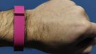 Fitbit’s Flex is  an “electronic coach”. The firm offers bracelets and clip-on devices which monitor your physical activity, especially steps taken, pace and heart rate. Photograph: Josep Lago/AFP/Getty 