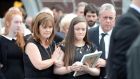 Paul and Catherine O’Connor (parents) with  daughter Clodagh at the funeral of Niamh O’Connor at the Sacred Heart Church, Glounthaune, Cork on Saturday. Photograph: Provision