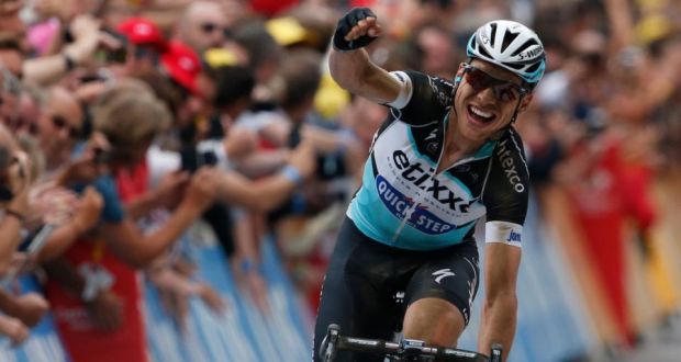 Etixx-Quick Step rider Tony Martin of Germany celebrates as he crosses the finish line to win the 223.5-km (138.9 miles) 4th stage of the 102nd Tour de France cycling race from Seraing in Belgium, to Cambrai, France. Photo: Benoit Tessier/Reuters