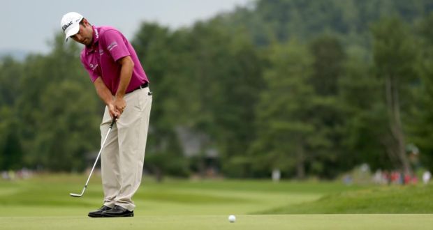Robert Streb ‘putts’ with his 56-degree wedge on the 17th during the final round of the Greenbrier Classic. Photograph: Darren Carroll/Getty Images
