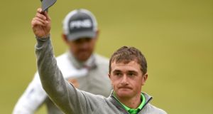 Paul Dunne  acknowledges the crowd on the 18th green after  the final round of the british  Open  at  St Andrews. Photograph: Stuart Franklin/Getty Images