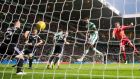 Celtic’s Dedryck Boyata scores his side’s  goal during the Uefa Champions League third round qualifying match against Qarabag FK at Celtic Park. Photograph: Jeff Holmes/PA 