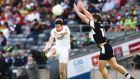 Tyrone’s Seán Cavanagh gets his shot away despite the attempted block of Sligo’s Brian Curran during the  All-Ireland Round 4B qualifier at Croke Park. Photograph:  Cathal Noonan/Inpho