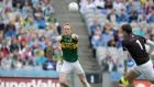 Kerry’s Colm Cooper palms home the first of his two goals in the All-Ireland quarter-final against Kildare at Croke Park. Photograph: Morgan Treacy/Inpho