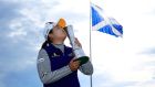  Inbee Park of South Korea kisses the trophy following her victory during the final round of the British Open at Turnberry.  Photo:  David Cannon/Getty Images