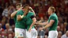 Simon Zebo is congratulated by three other Ireland try scorers, Jamie Heaslip, Felix Jones and Keith Earls after his score against Wales at the Millennium Stadium. Photograph: PA