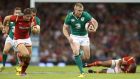 Keith Earls breaks with the ball to score an Ireland try during the international match against Wales at the Millennium Stadium on Saturday. Photograph: David Rogers/Getty Images.