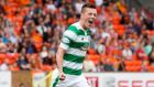 Celtic’s Callum McGregor celebrates scoring his sides third goal during their 3-1 win over Dundee United at Tannadice. Photograph: PA