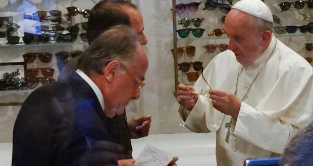 Pope Francis tries on a pair of spectacles at his optician’s shop in Via del Babuino, in central Rome. Photograph: Daniel Soehne/AP