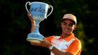  Rickie Fowler poses with the winner’s trophy after winning the Deutsche Bank Championship at TPC Boston  in Norton, Massachusetts. Photograph: Ross Kinnaird/Getty Images