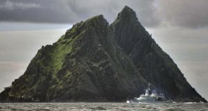 An Irish navy ship patrols around Skellig Island as ‘Star Wars: Episode VII’  begins filming in  July2014. Photograph: Getty