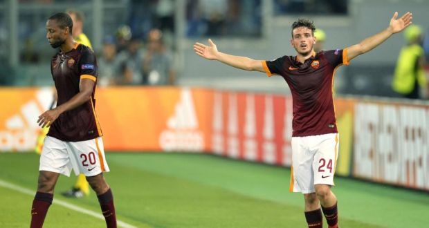 Roma’s  Alessandro Florenzi  celebrates after scoring from just inside the Barcelona half during the Champions League match at the  Olympic Stadium. Photograph: Andreas Solaro/AFP/Getty Images