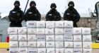  Irish naval service personnel with cocaine seized from the ‘Makayabella’. Photograph: PA 