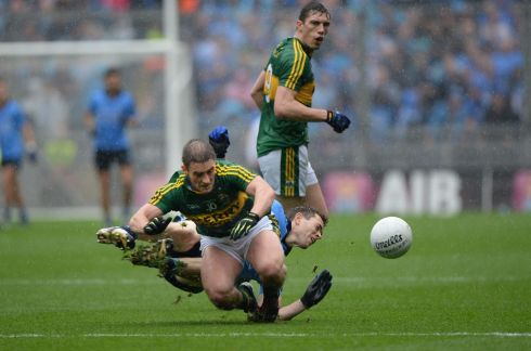 Dean Rock and Stephen O'Brien battle for possession.