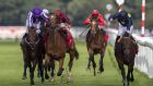 Bondi Beach ridden by Colm O’ Donoghue (purple cap) wins The Ladbrokes St Leger Stakes Race after Simple Verse ridden by Andrea Atzeni was disqualified following a steward’s inquiry at Doncaster Racecourse. Photograph: Julian Herbert/Getty Images