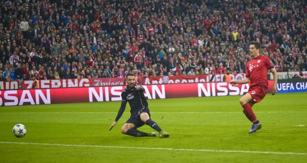 Bayern Munich’s Polish  striker Robert Lewandowski scores his first goal during the  Champions League match against Dinamo Zagreb in Munich. Photograph:  Guenter Schiffmann/AFP/Getty Images