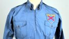 The blue cotton military-style shirt with epaulettes and breast pockets and embroidered shield-shaped Fine Gael badge stitched to the left breast will be auctioned on October 17th