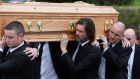 Jim Carrey carries the coffin of ex-girlfriend Cathriona White to Our Lady of Fatima Church, in her home village of Cappawhite, Co Tipperary on Saturday. Photograph: Niall Carson/PA 