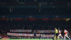 Bayern Munich fans hold a banner as they protest in the stands against the cost of tickets. Photograph: Getty Images